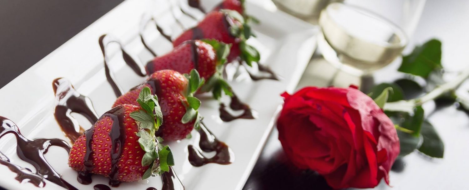 Chocolate covered strawberries champagne rose romance